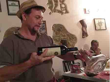 Sandro Signori serving some organic Tuscan wine